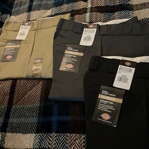 32x32 straight leg loose fit twill work pants. Tan, Black, and Navy